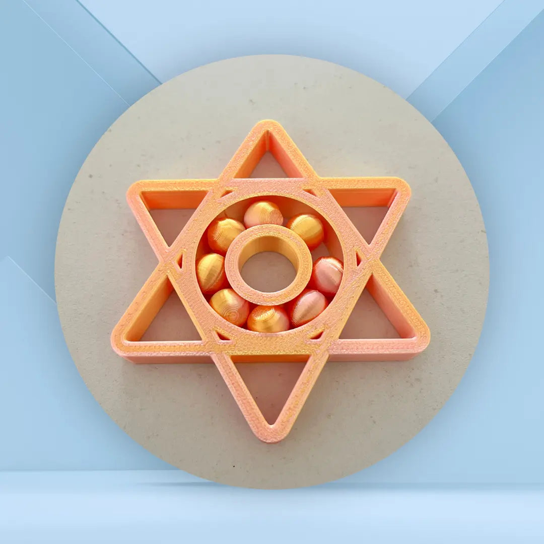 spinner étoile orangé/jaune